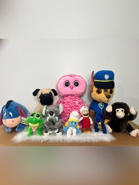 Stuffed plush toy lot , Eeyore, Paw Patrol, Smurfette, Peekaboo Monkey + more
